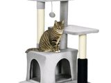 a cat that is sitting on top of a cat tree