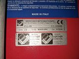 a label on the back of a machine that says made in italy