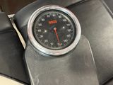 an image of a weight scale on a car seat