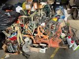 a pile of assorted items sitting on the floor