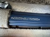 a close up of a remote control in the back seat of a car