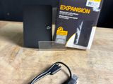 a box and a charger sitting on a table