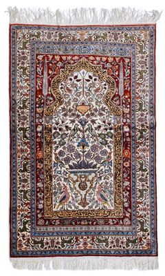 an oriental rug with a floral design on a white background