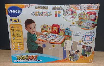 a box with a picture of a kid playing with a tablet