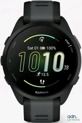 a close up of a smart watch on a white surface