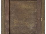 an old wooden picture frame with peeling paint on it