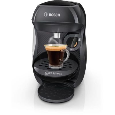 gros plan d'une machine à café avec une tasse de café
