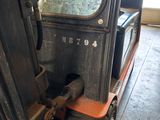 a forklift that is parked in a garage
