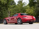 the red sports car is parked in the parking lot