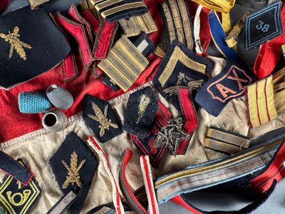 many different types of ties laid out on a table
