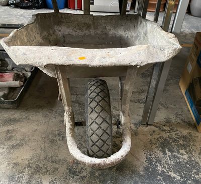 a wheelbarrow in the middle of a wheelbarrow in the middle of a garage