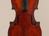 an old violin with a bow on a white background