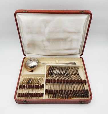 a red case with silverware in it on a white surface