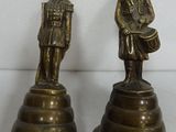 pair of brass figurines of a soldier and a drummer