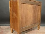 an image of a wooden cabinet with a drawer on top of it
