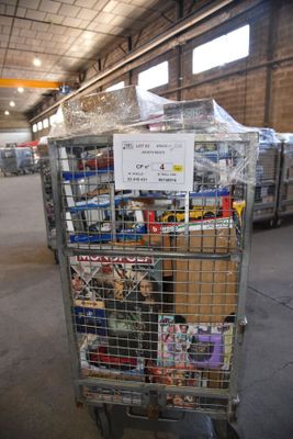 a cart that has many items in it in a warehouse