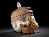 an image of a skull with a crown on it ' s head