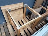 a wooden bench that is sitting on a pallet