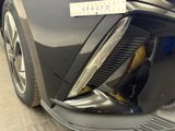 a close up of a car with a sticker on it ' s bumper