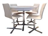 a picture of a white table and four chairs