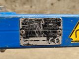 a close up of a sign on a blue bike