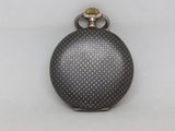 a silver pocket watch with a chain on it