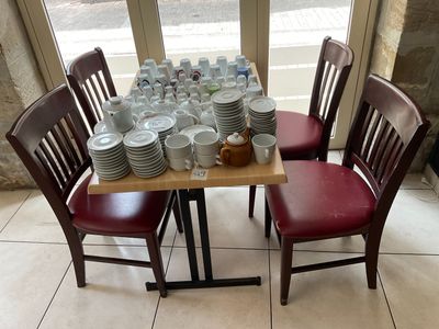 a table with a lot of plates and cups on it
