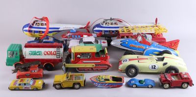 a lot of toy cars that are on a white surface