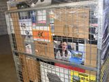 a metal cart with many boxes on top of it