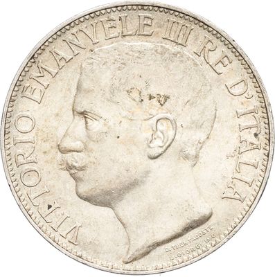 une vieille pièce britannique représentant la tête d'un homme de profil