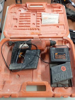 a tool box with tools in it sitting on a table