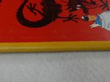 a book that is sitting on a table next to a keyboard
