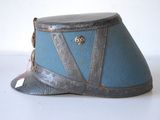 a blue hat that is sitting on a white table