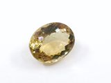 citrine faceted oval cut gemstone with yellow topaz