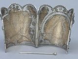 a silver plate that has been made to look like it has been made out of metal