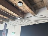 a light that is hanging from the ceiling in a room