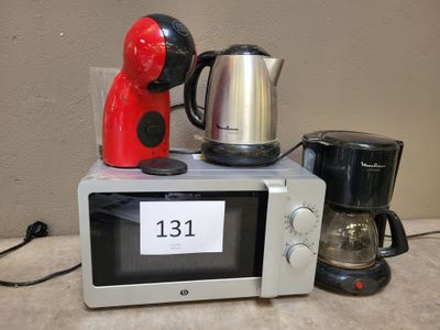 a microwave and a coffee maker sitting on top of a counter
