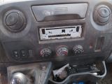 a car dashboard with a bunch of items inside of it