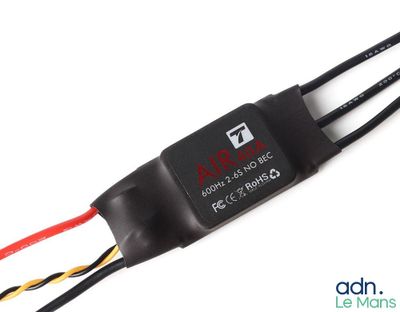 a close up of a remote control module on a white background