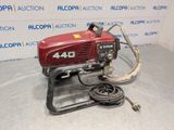 a close up of a small engine on a metal stand