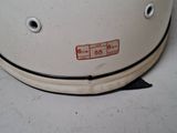 a white helmet that is sitting on a table
