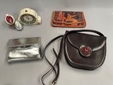 a purse and other items that are on a table