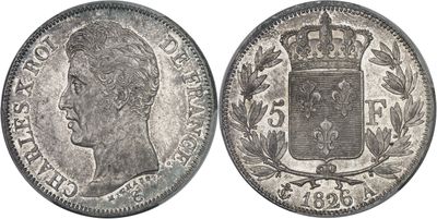 a close up of a coin with a crown on top of it