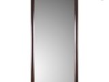 a large mirror with a wooden frame on a white background