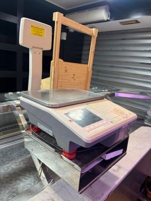 a machine that is sitting on a conveyor belt