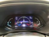 the dashboard of a car with a digital display on it