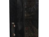 a black vase that is sitting on a table