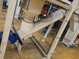 a machine that is sitting on the floor in a factory