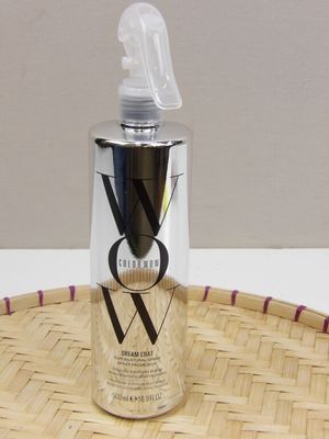 an image of a bottle of body wash sitting on a basket