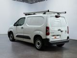 a white van that is parked in a room